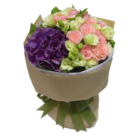 Hydrangea Flowers Arranged with Roses and Matching Greens