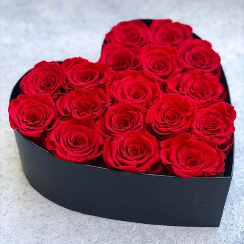 Red Roses with Matching Greens in a Heart-shaped Box