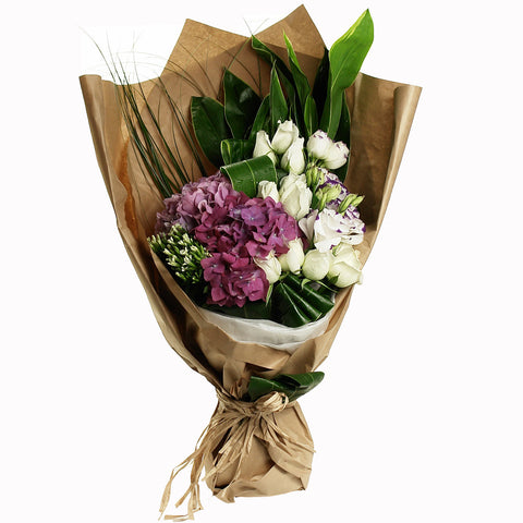 White Roses Arranged with Hydrangea and Matching Greens